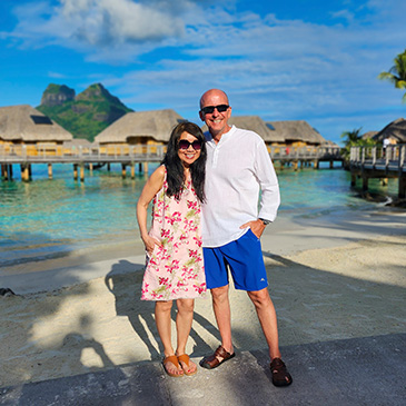 A couple at an exotic beach-front resort