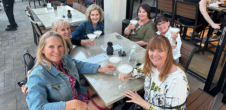 Cheryl and her friends enjoying Coconut Cloud Martinis