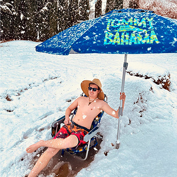 Person in snow with beach chair